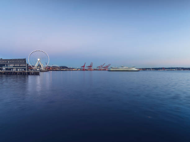 istock Seattle waterfront and Ferris Wheel at dusk 820272326