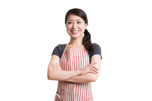 istock Asian smiling woman wearing an apron 820274642