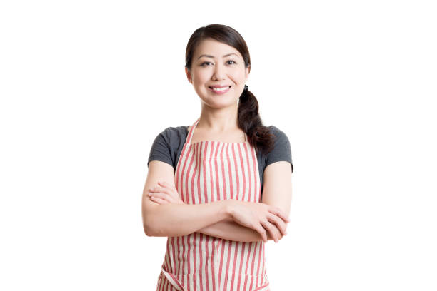 istock Asian smiling woman wearing an apron 820274682