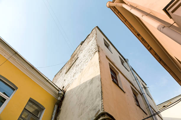 istock view from bottom of abandoned apartment buildings 820279556