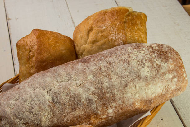 istock Baskets of breads in table wood 820302428
