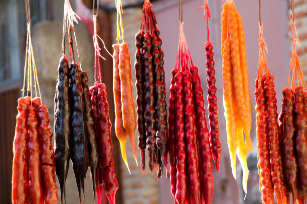 istock Traditional  sausage-shaped candies with walnut in it 820305452