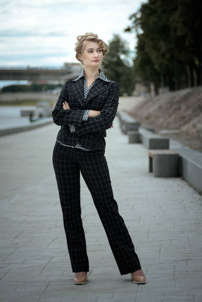 istock Woman looking toward standing on the pavement 820314426