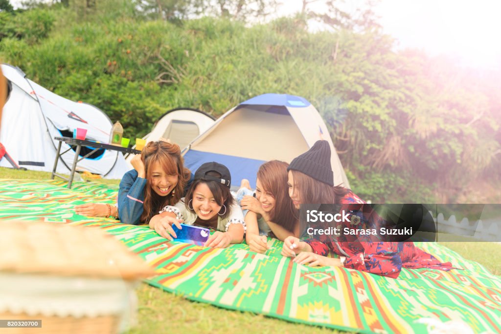 Young female having fun. Camping Stock Photo