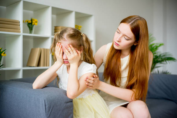 istock Mother comforting daughter 820321418