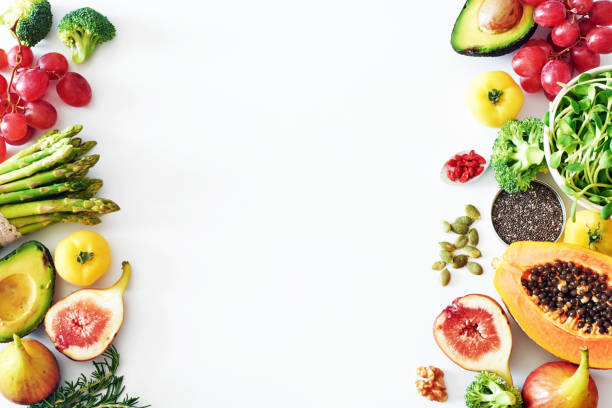 istock Fresh veggies and fruits food frame on white background with copy space. 820334914