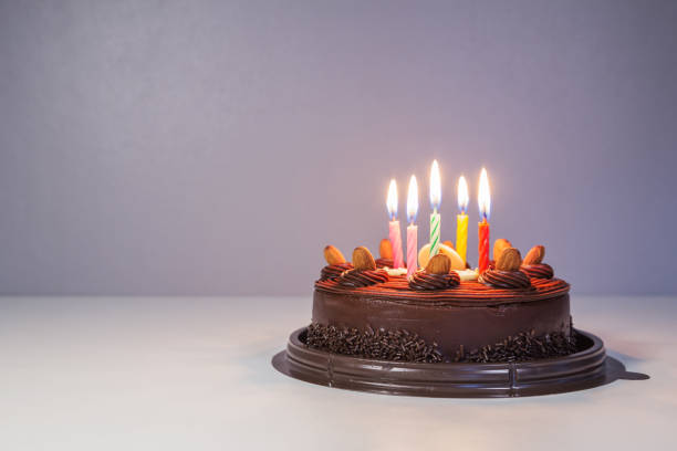 istock chocolate cake with birthday light candle 820341652