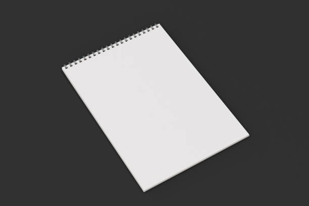 istock Blank white notebook with metal spiral bound on black background 820342916