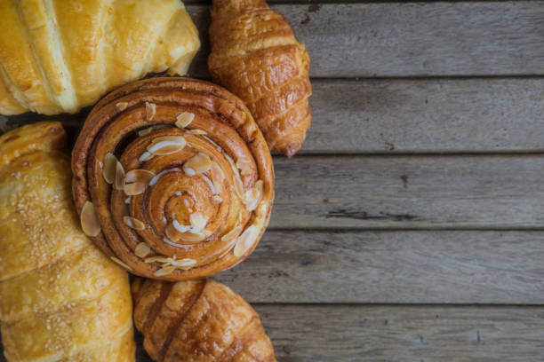 istock fresh bread and baked goods on wooden 820345638