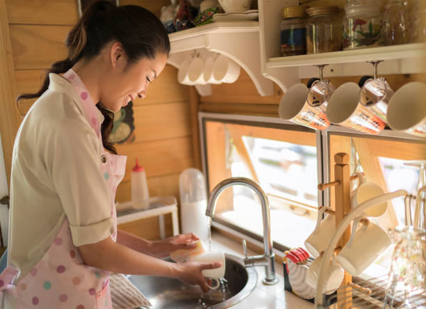 istock Mothers are doing housework she was washing dishes 820347184