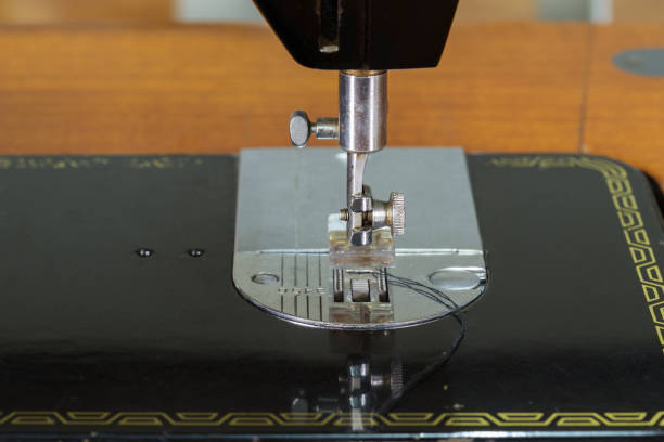 istock close-up needle of the sewing machine 820358392