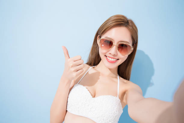 istock woman selfie happily 820378926