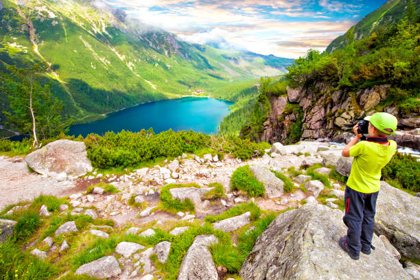 istock Boy is photographing mountain Marine Eye 820384072