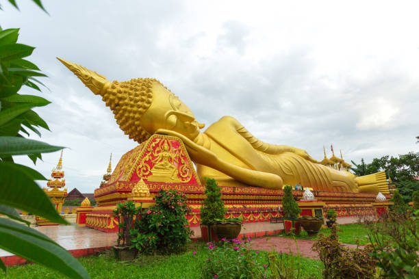istock Reclining Buddha statue at Wat Pha That Luang, Vientiane, Laos. 820391202