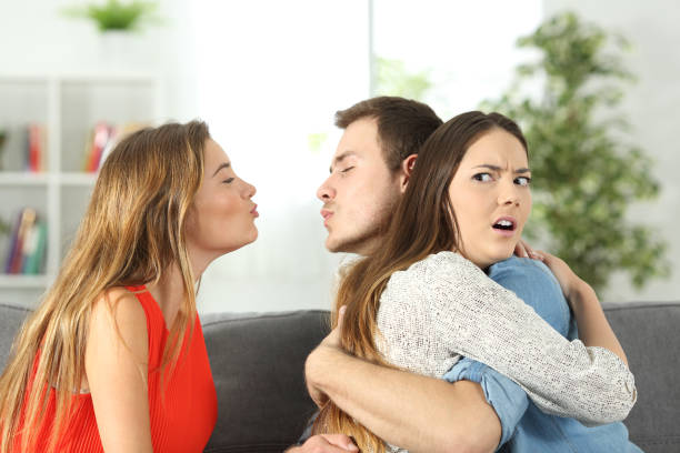 istock Girlfriend discovering that her boyfriend is cheating 820391334