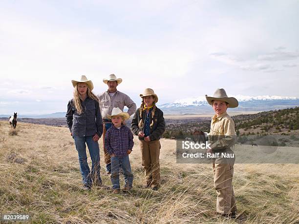 Portrait Of Ranch Family Outdoors Stock Photo - Download Image Now - Family, Child, Cowboy