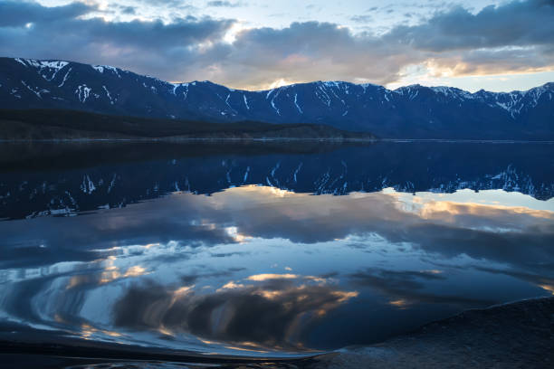 istock Spectacular sunset landscape with beautiful reflections in water 820406476