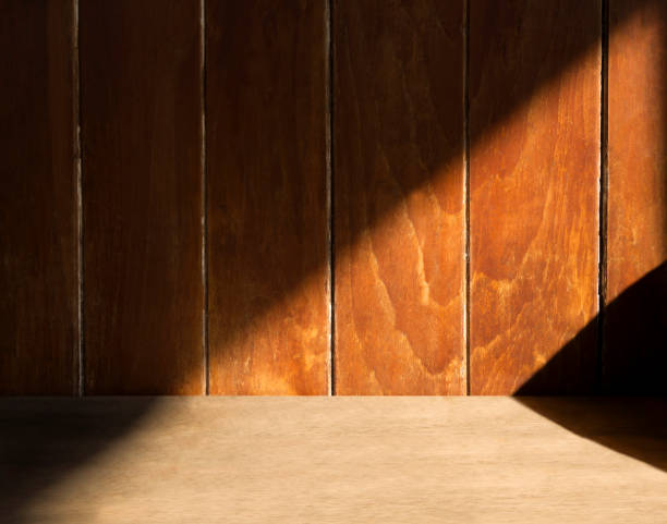 istock Wooden wall background or texture in a evening light with shadows. 820416084