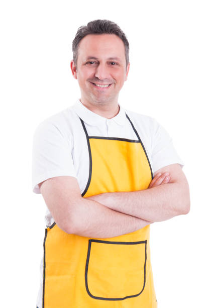 istock Confident smiling supermarket clerk posing with folded arms 820469292