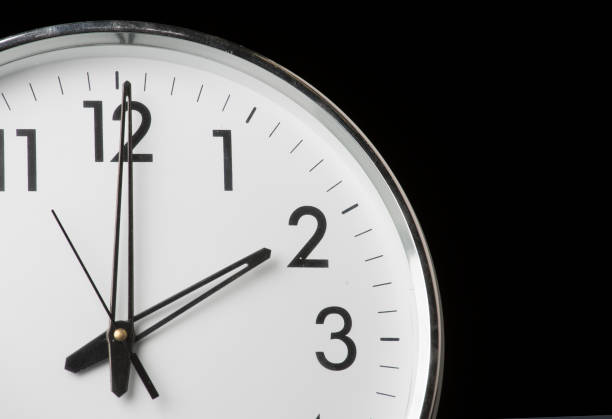 Analog clock with the time 2 o'clock stock photo