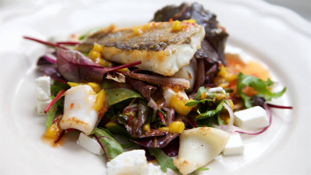 istock Sea Bass and Calamari Dish 820473814