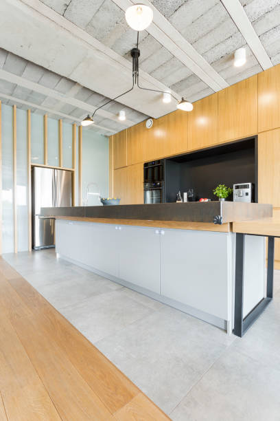 istock Modern kitchen with wooden furniture 820477774