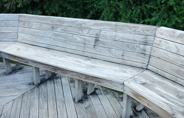 istock wood bench in pavilion. 820481120