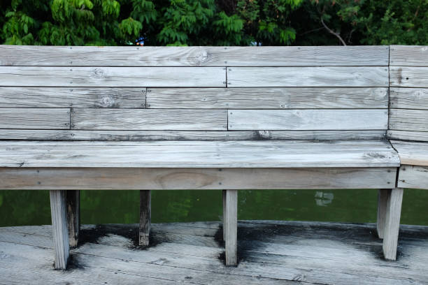 istock wood bench in pavilion. 820481320
