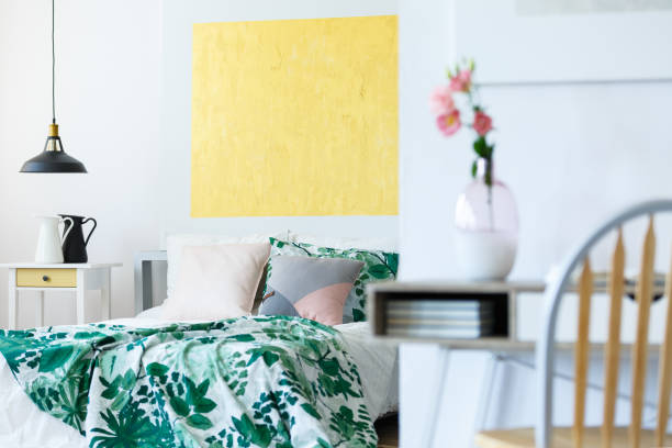 istock Pastel bedroom with artworks 820491560