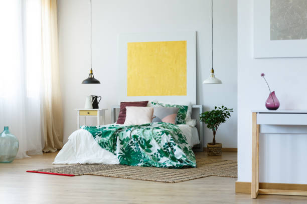 istock Spacious bedroom with artworks 820491618