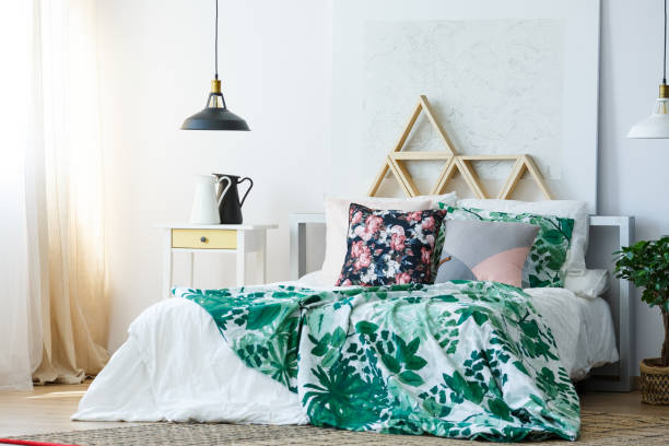 istock Green and white floral bedclothes 820491628