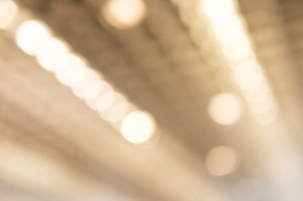 istock Bokeh light, shimmering blur spot lights on gold 820499548
