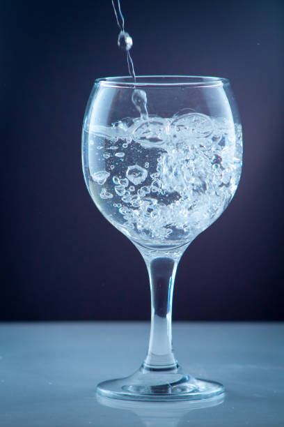 istock Pure water pouring into a transparent glass 820499604
