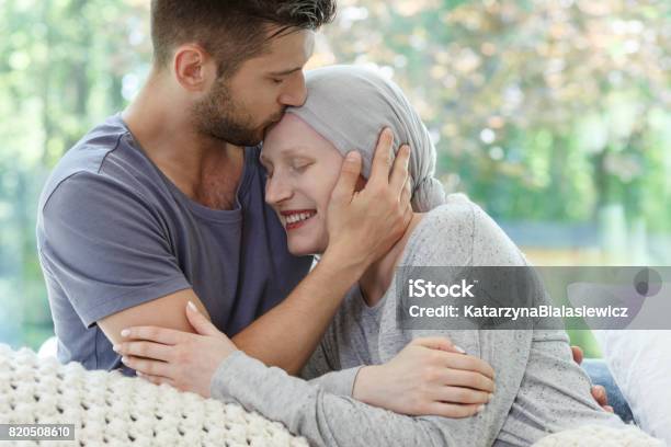 Sick Woman Being Kissed Stock Photo - Download Image Now - Patient, Lung Cancer, Women