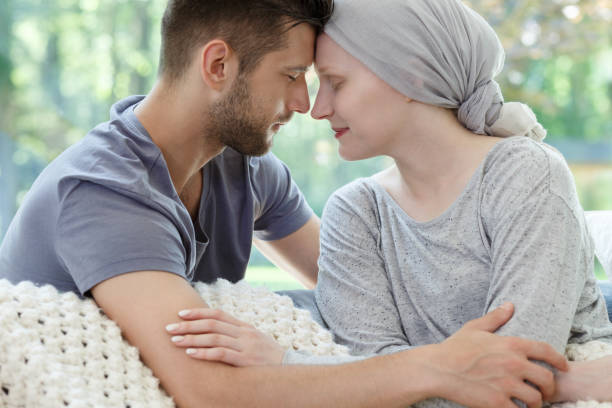 istock Husband and wife touching heads 820508644