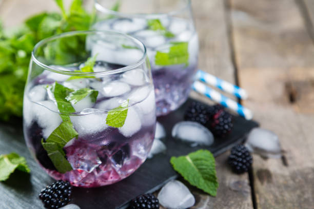 istock Blackberry mojito and ingredients on rustic background 820515132