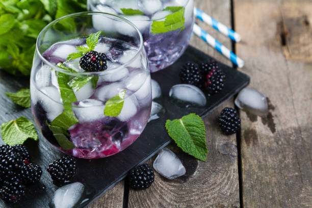 istock Blackberry mojito and ingredients on rustic background 820515188