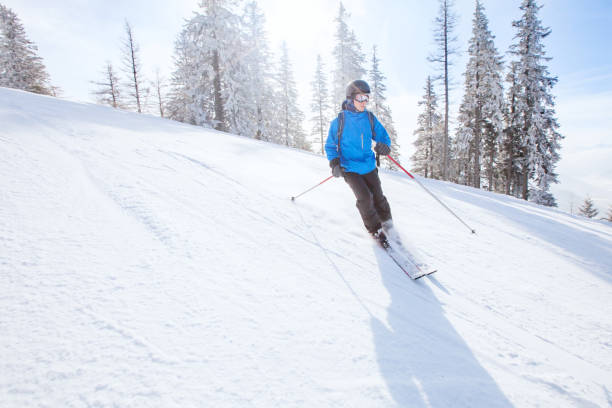 istock skier in mountains, winter sport 820520202