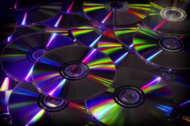 istock Close up of DVD and CD with postproduction effects. background. 820550946