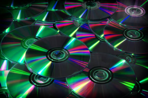 istock Close up of DVD and CD with postproduction effects. background. 820550984