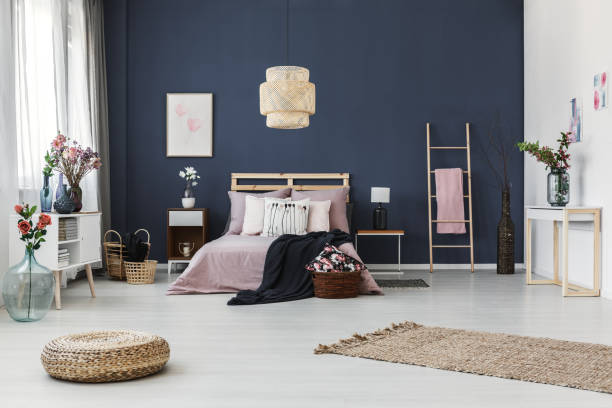 istock Dark blue wall in bedroom 820555624