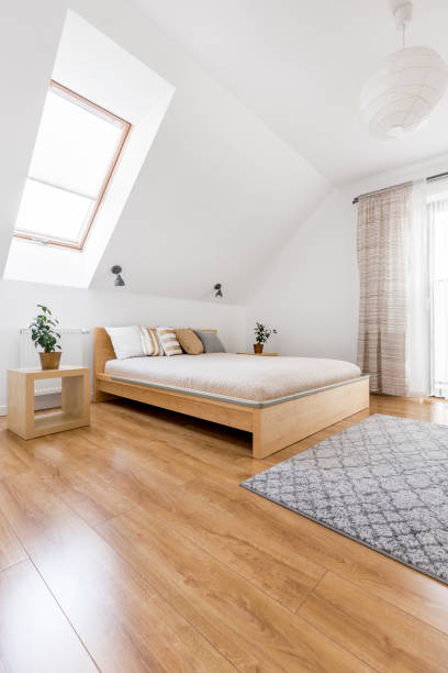 istock Wooden bed in cozy bedroom 820569884