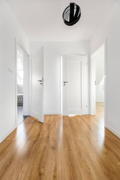 istock Wood flooring and snow-white walls 820569946