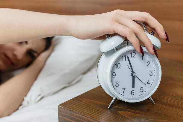 istock Woman stop clock at morning time 820570772