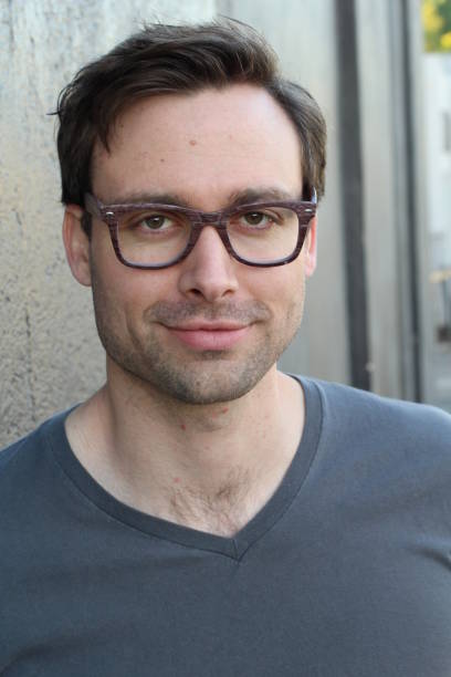 istock Handsome male with glasses portrait 820577740