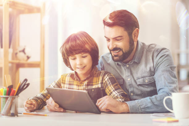 istock Joyful happy man spending time with his son 820583310