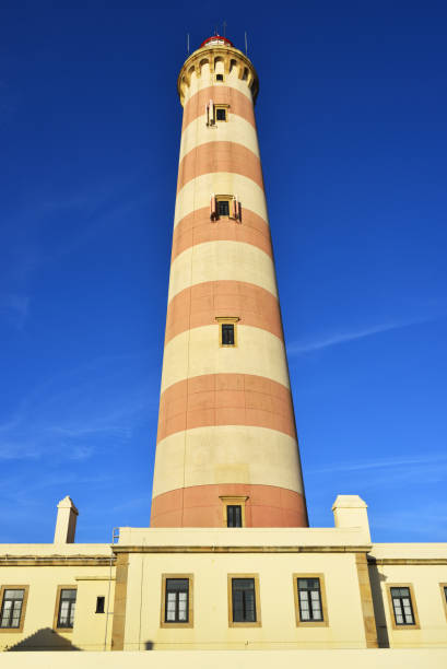 Position lights red and green on the wall of the entrance to the lighthouse