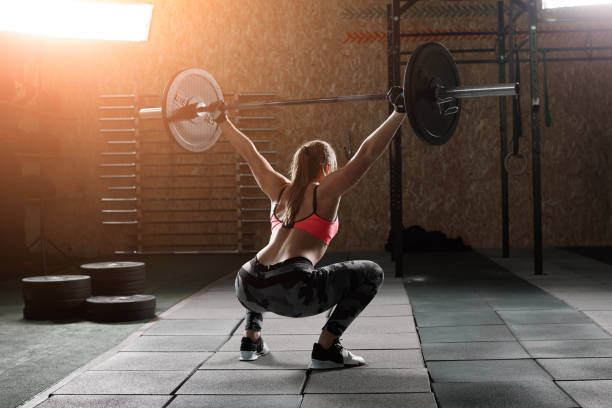 istock Cute girl doing exercises in gym 820583998
