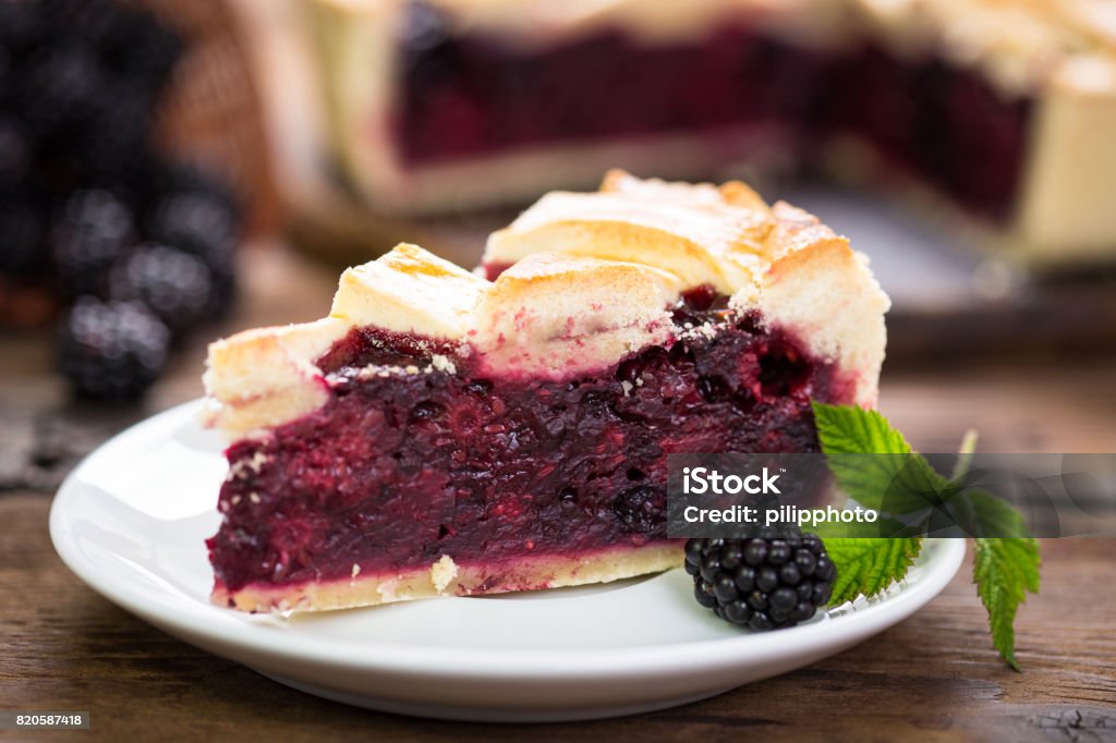 Blackberry foot Blackberry pie on the plate Sweet Pie Stock Photo