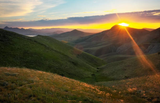 istock Mountain valley during sunrise. Natural summer landscape 820589248
